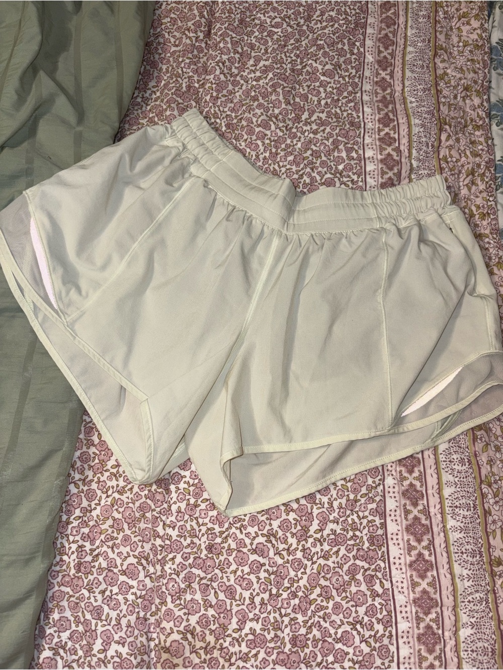 Lululemon hotty hot shorts in a very light green/yellow color
